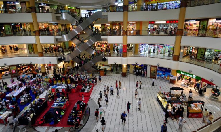 busy shopping mall with restrooms serviced by Houston commercial plumbing repair